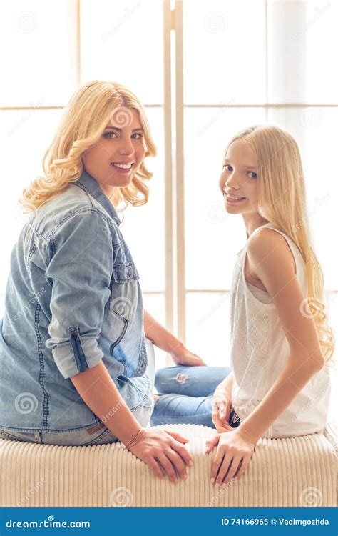 Blonde mom and daughter